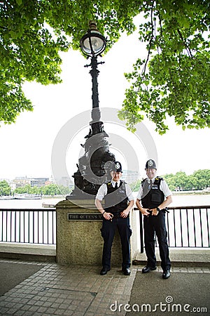 Bobbies in the city of the London Editorial Stock Photo